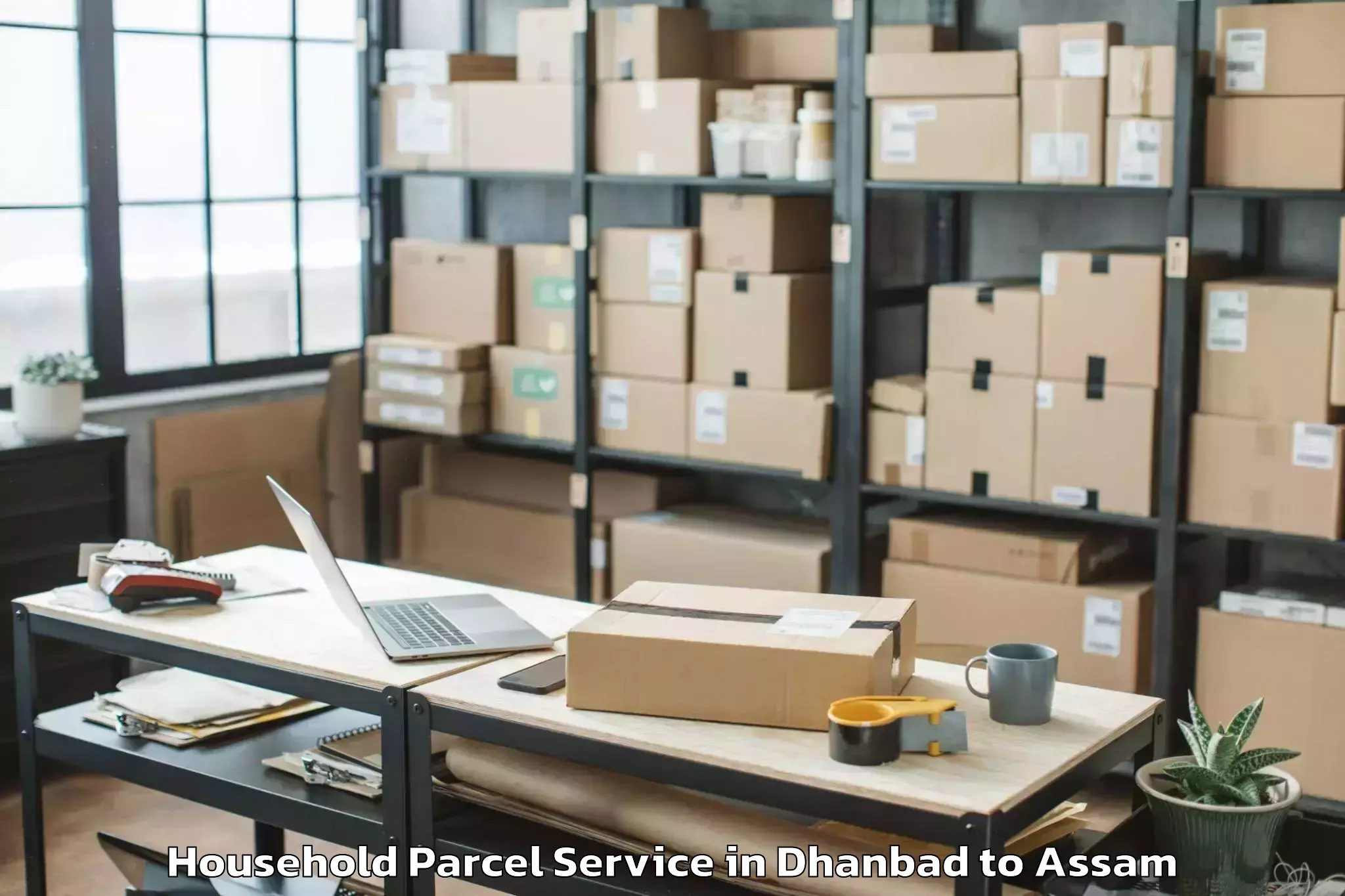 Book Dhanbad to Rangapara Household Parcel Online